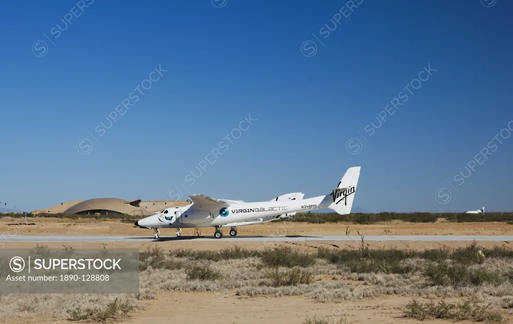 Virgin Galactic´s White Knight 2 with Spaceship 2 on the runway at the Virgin Galactic Gateway spaceport, Upham, New Mexico, United States of America,...