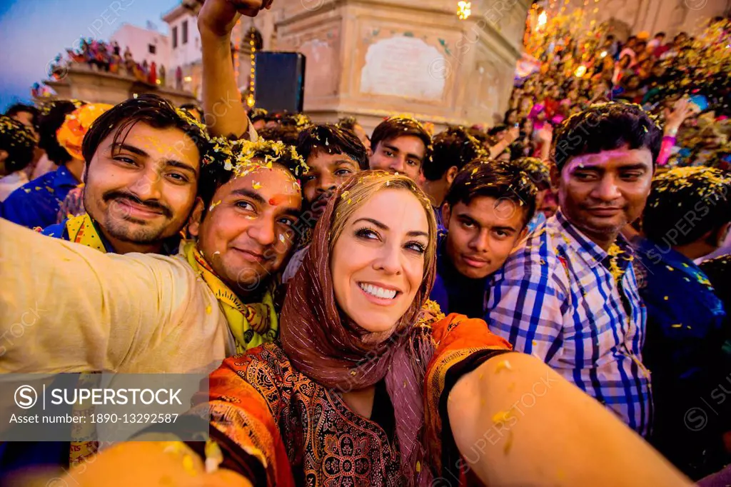 Laura Grier selfie in the crowd during the Flower Holi Festival, Vrindavan, Uttar Pradesh, India, Asia