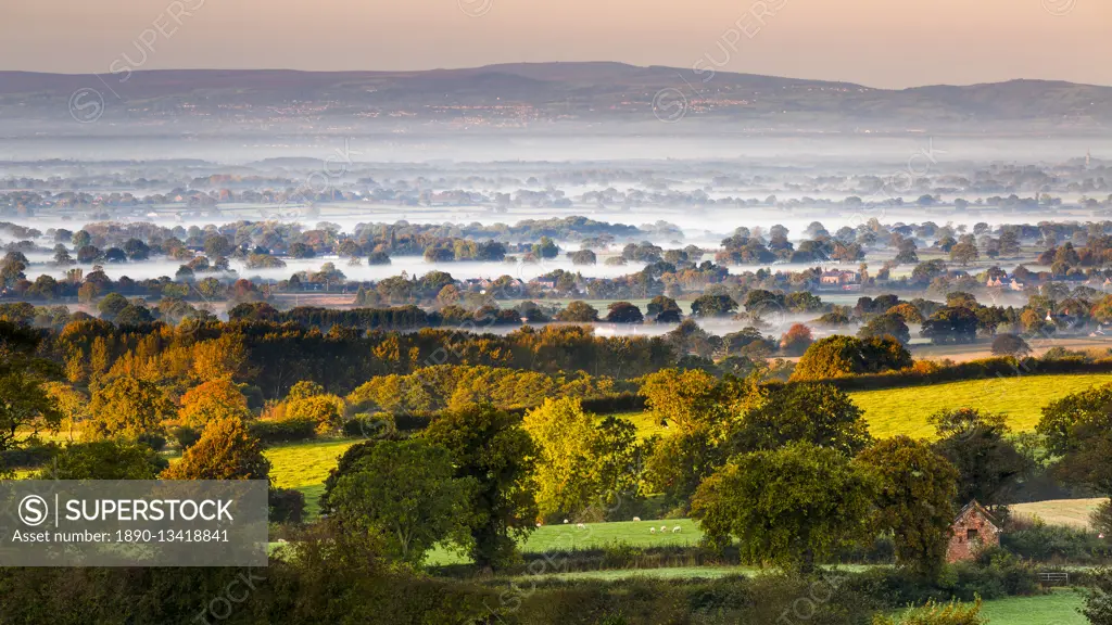 Autumn mists on the Cheshire plain extending across the landscape to the Welsh hills, Cheshire, England, United Kingdom, Europe