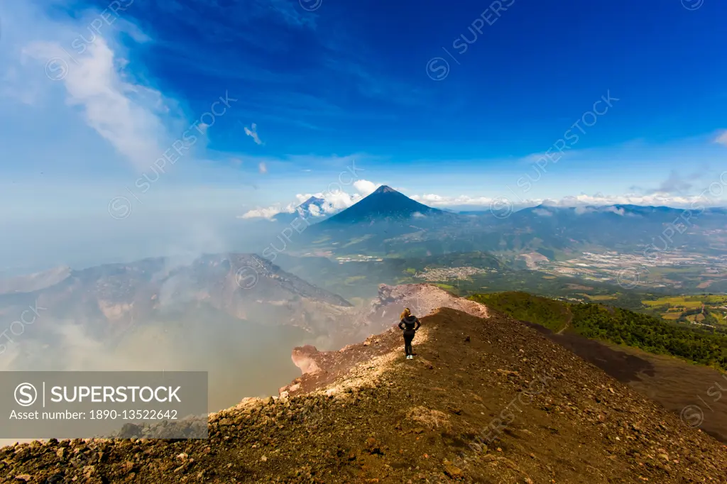 Cresting the peak of Pacaya Volcano in Guatemala City, Guatemala, Central America