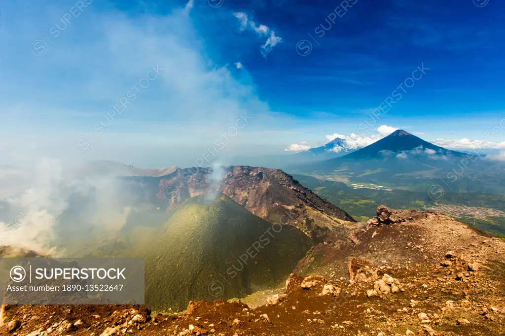 Cresting the peak of Pacaya Volcano in Guatemala City, Guatemala, Central America