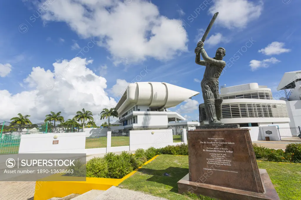 Garfield Sobers statue and The Kensington Oval Cricket Ground, Bridgetown, St. Michael, Barbados, West Indies, Caribbean, Central America