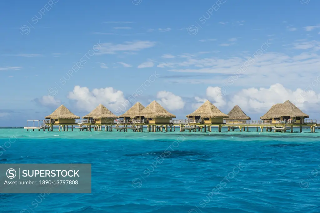 Overwater bungalows in luxury hotel in Bora Bora, Society Islands, French Polynesia, Pacific