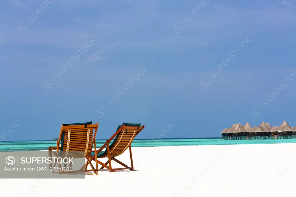 Wooden sun loungers on beach, Coco Palm, Dhuni Kolhu, Baa Atoll, Republic of Maldives, Indian Ocean, Asia