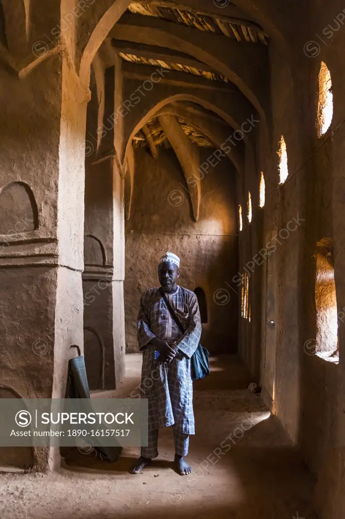 Imam praying in a beautiful Hausa style architecture Mosque in Yaama, Niger, West Africa, Africa