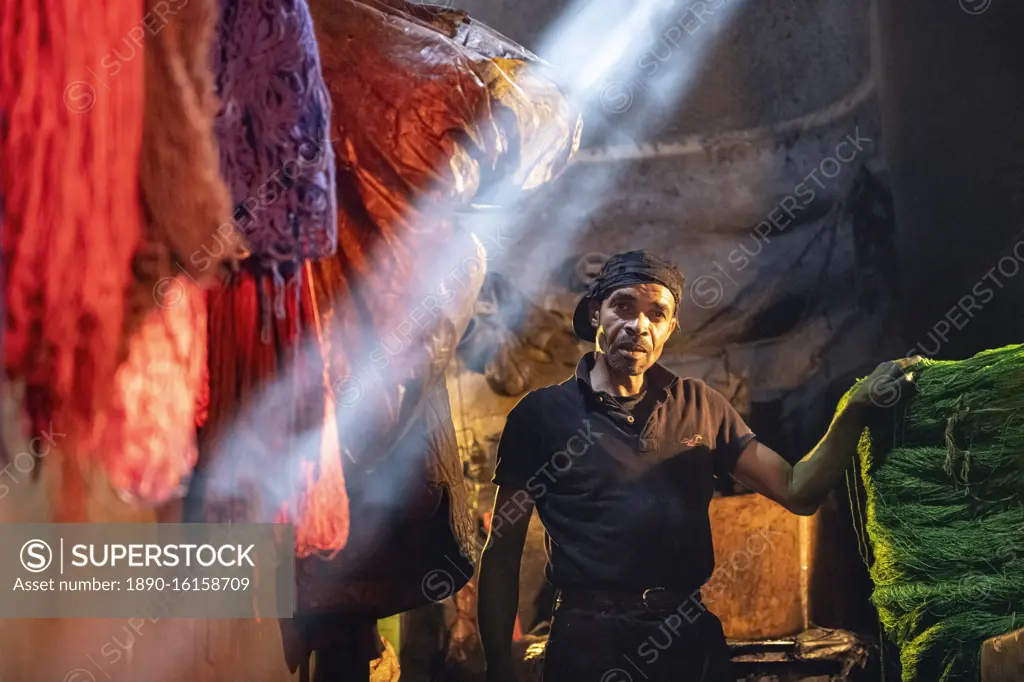 Man working in the dyer's souk, Marrakech, Morocco, North Africa, Africa