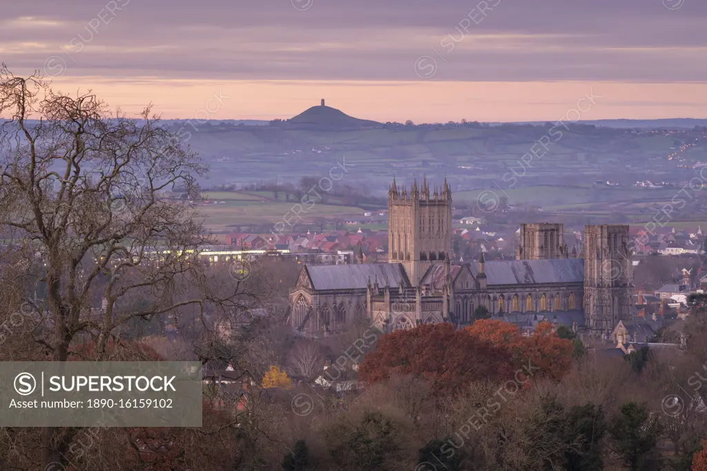 Wells Cathedral and Glastonbury Tor at dawn in winter, Wells, Somerset, England, United Kingdom, Europe