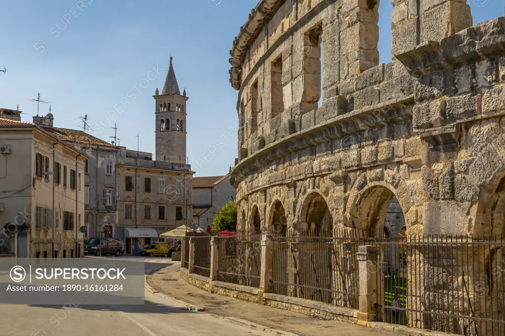 View of Catholic Church next to the Roman Amphitheatre, Pula, Istria County, Croatia, Adriatic, Europe