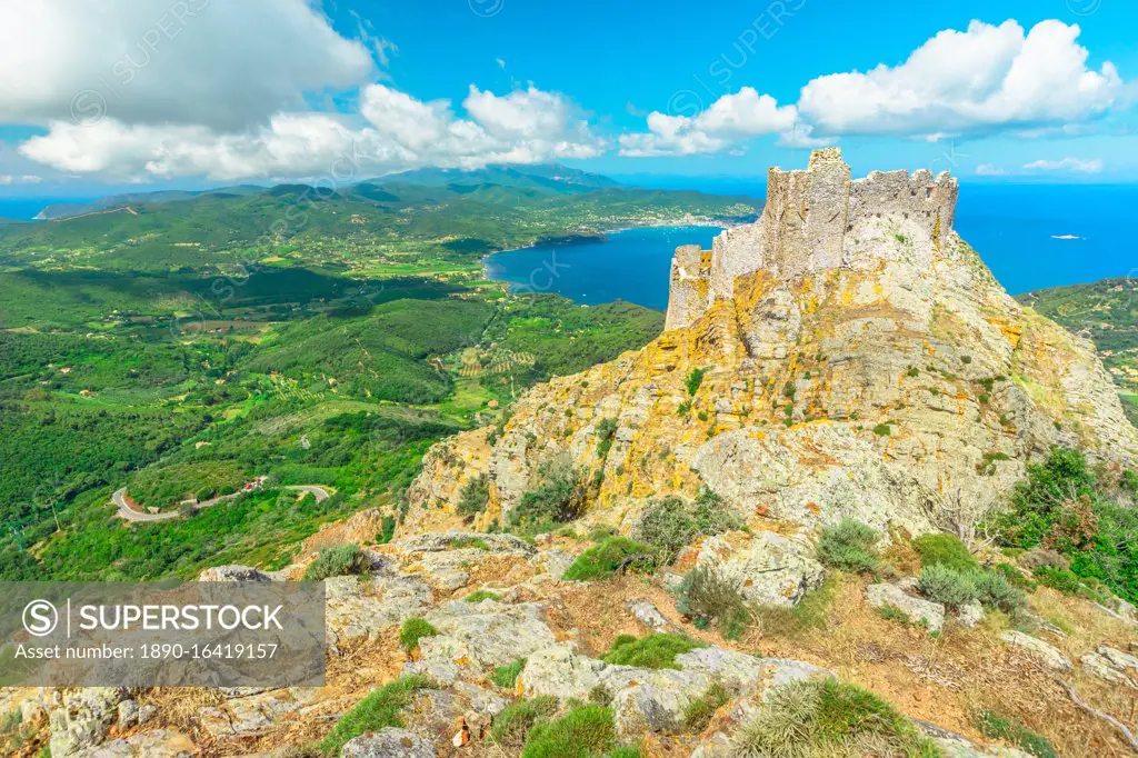 Iconic view from top of Elba mountain of Volterraio Castle on rock at 394 m, Fortress of Volterraio, symbol of Elba Island, dominates Portoferraio Gulf, Tuscan Archipelago, Tuscany, Italy, Europe