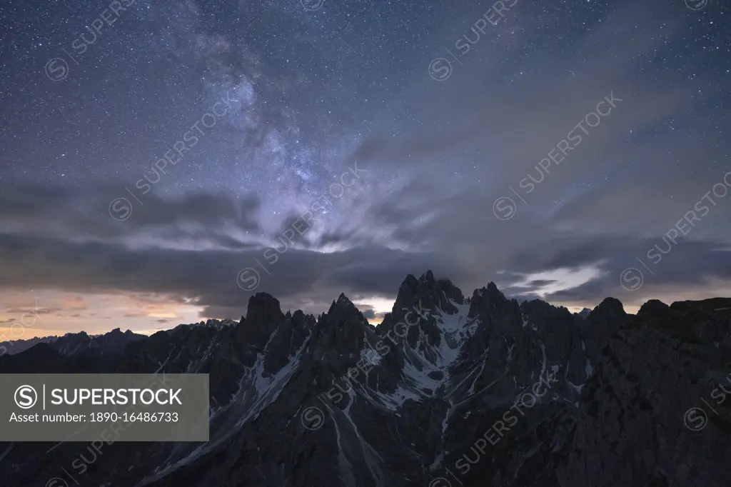 Milky Way and stars over the sharp pinnacles of Cadini di Misurina, Dolomites, Belluno province, Veneto, Italy, Europe