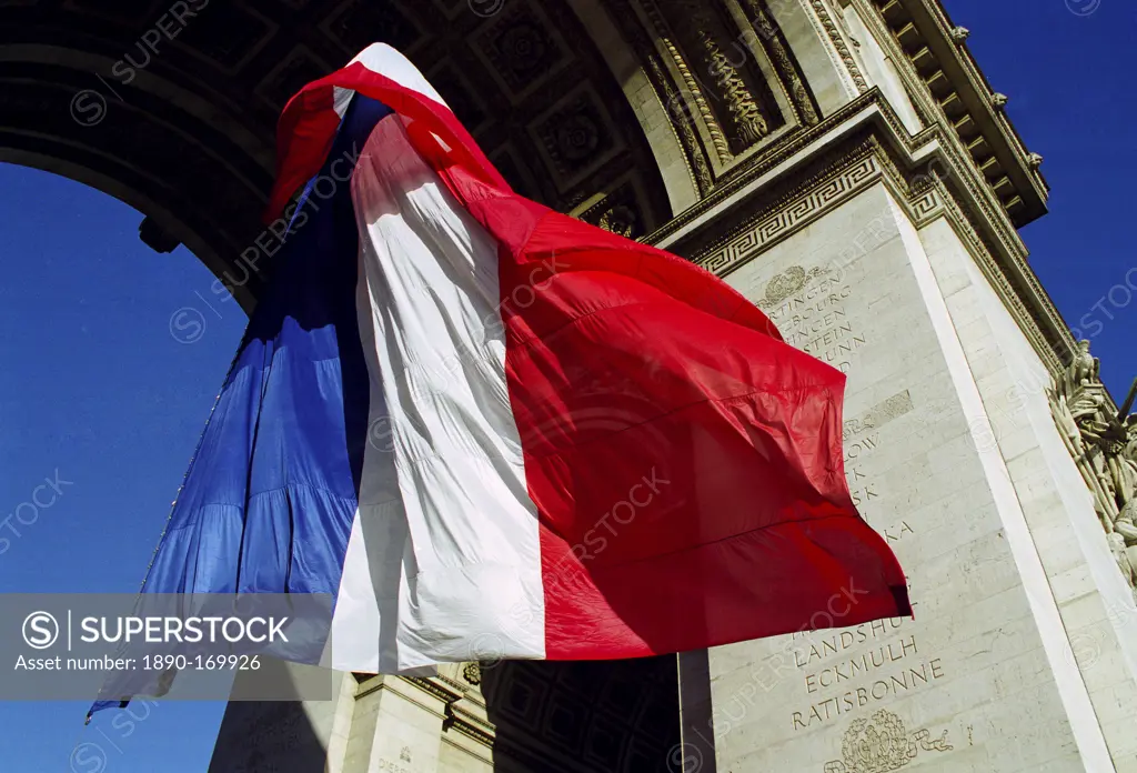 French Tricolore flag at the Arc de Triomphe for Remembrance Day in Paris, France