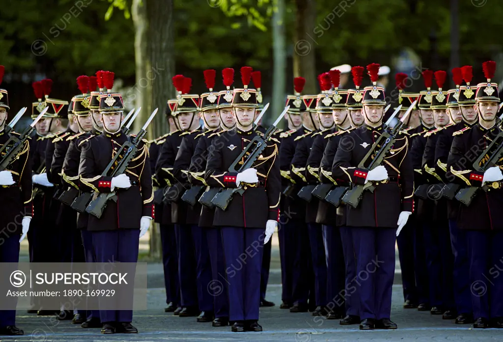 French soldiers with fixed bayonets in parade for Remembrance Day at the Arc de Triomphe in Paris, France