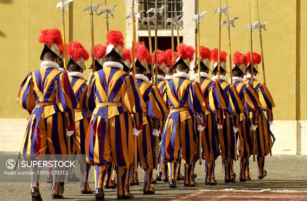 Swiss ceremonial guards in traditional striped uniforms at the Vatican, Vatican city