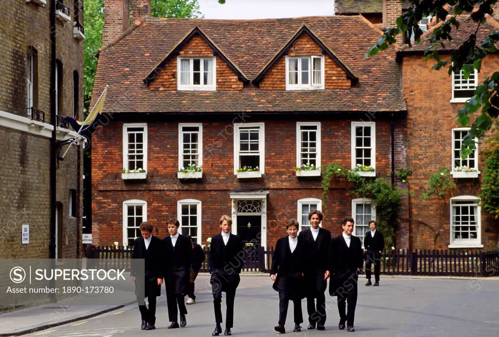 Eton schoolboys in traditional tailcoats at Eton College boarding school, Berkshire, UK.