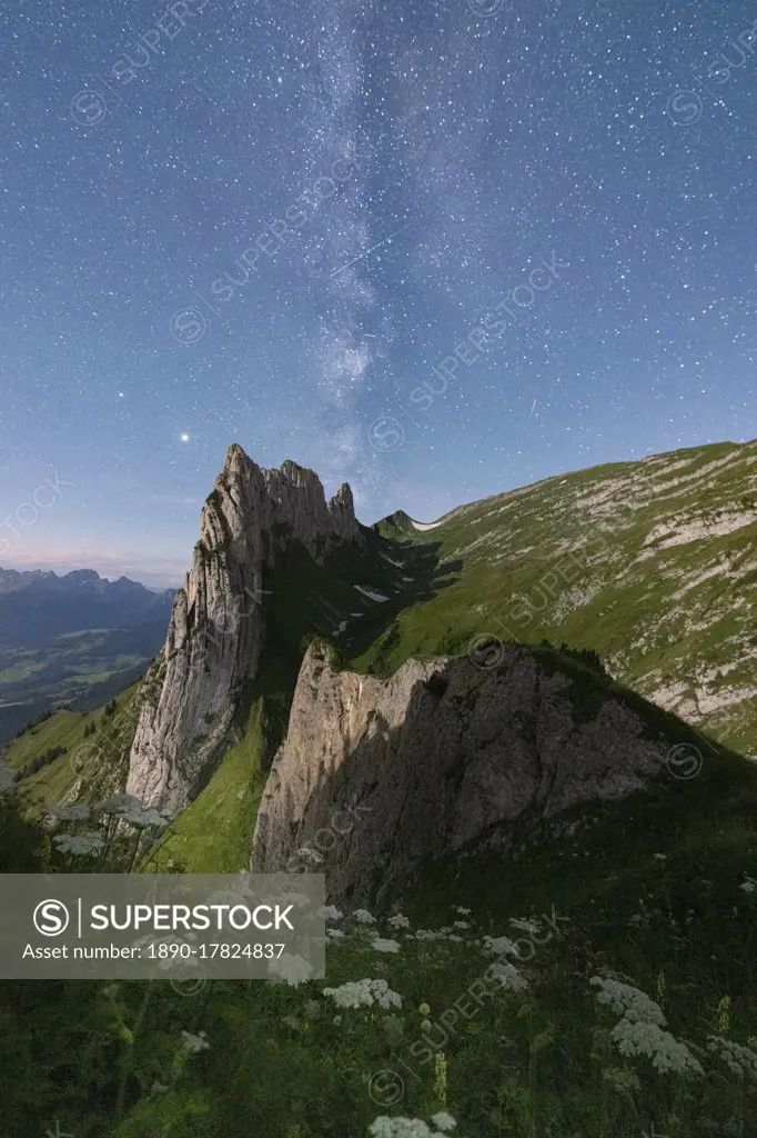 Milky way over Saxer Lucke mountain peak in summer, Appenzell Canton, Alpstein Range, Switzerland, Europe