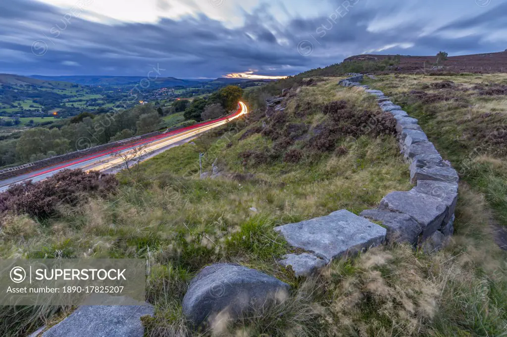 View traillights toward Hathersage from Lawrencefield during autumn, Hathersage, Hope Valley, Derbyshire Peak District, Derbyshire, England, United Kingdom, Europe