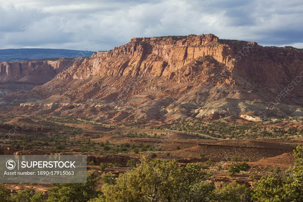 View from Panorama Point across valley to rugged cliffs of the Waterpocket Fold, sunset, Capitol Reef National Park, Utah, United States of America, North America