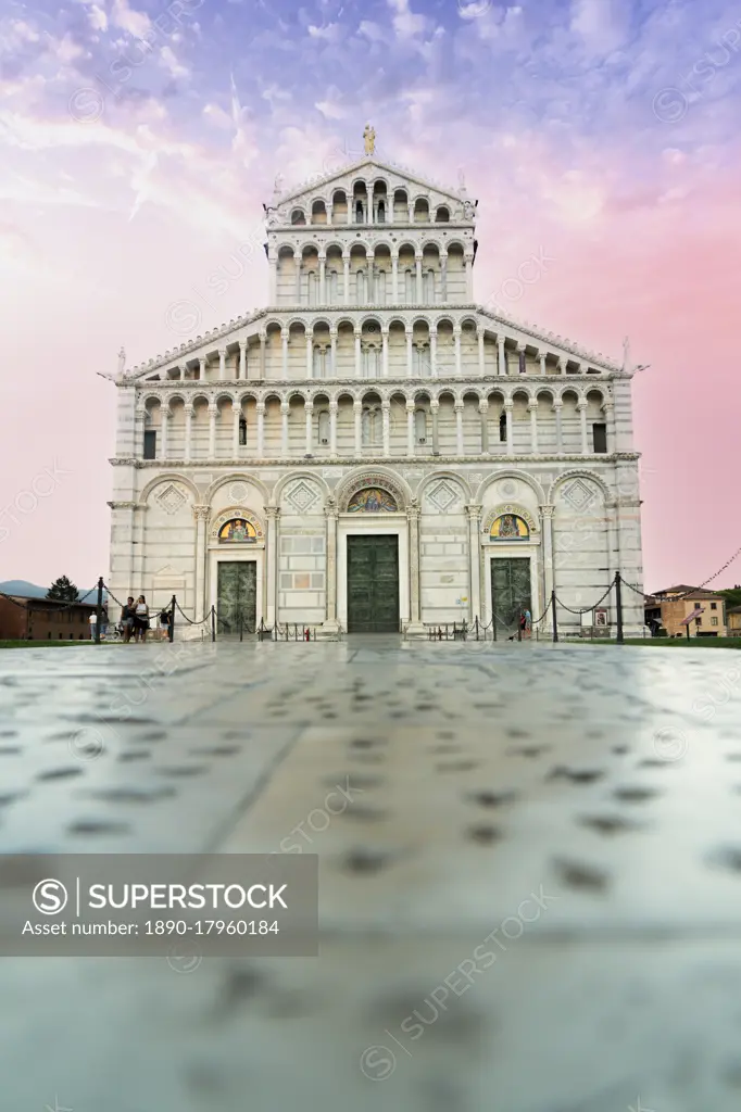 Romanesque facade of Pisa Cathedral (Duomo) under romantic sky at sunrise, Piazza dei Miracoli, UNESCO World Heritage Site, Pisa, Tuscany, Italy, Europe