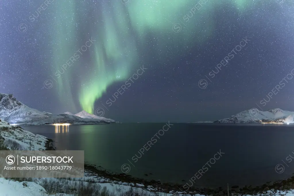 The Northern Lights (aurora borealis) lighting up the sky near Tromso, Norway, Scandinavia, Europe