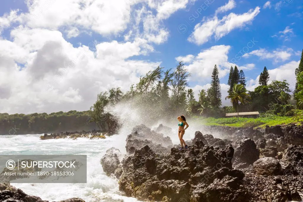 Woman enjoying the oceanside on Maui, Hawaii, United States of America, North America