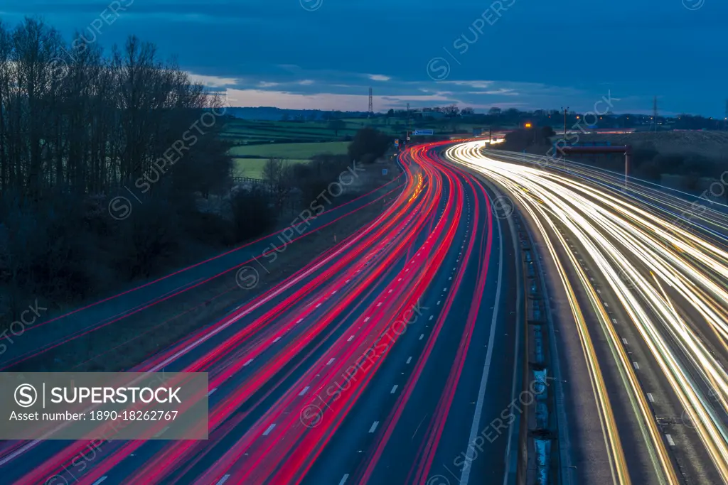 View of traffic trail lights on M1 motorway near Chesterfield, Derbyshire, England, United Kingdom, Europe