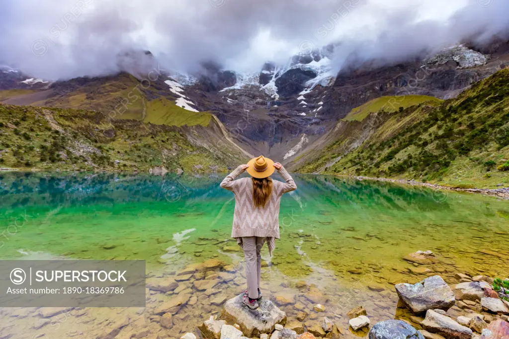 Woman trekking Humantay Lake, Cusco, Peru, South America