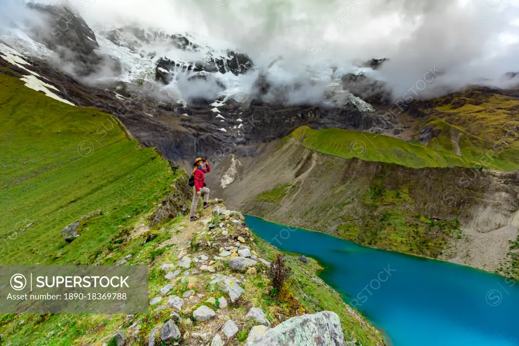 Woman trekking Humantay Lake, Cusco, Peru, South America