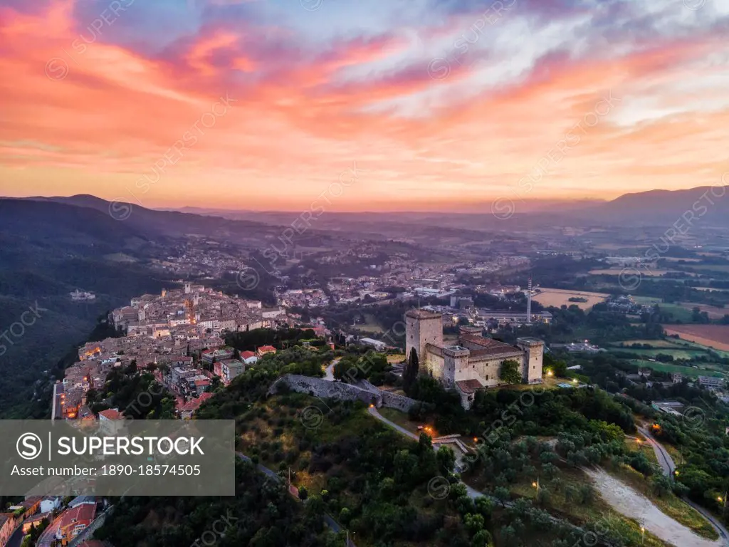 Cityscape of Narni at sunrise, with the fortress at the front and the old town beyond, Narni, Umbria, Italy, Europe