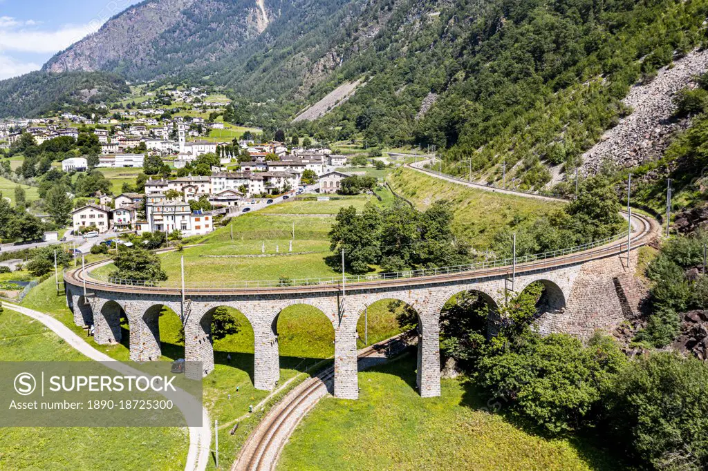 Aerial of the Brusio spiral viaduct, UNESCO World Heritage Site, Rhaetian Railway, Switzerland, Europe