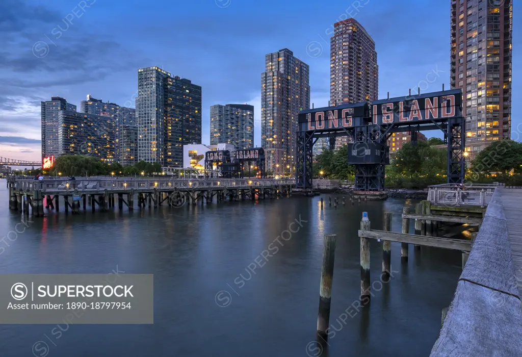 Gantry Plaza State Park at night with Long Island restored Gantries, Long Island City, New York, United States of America, North America