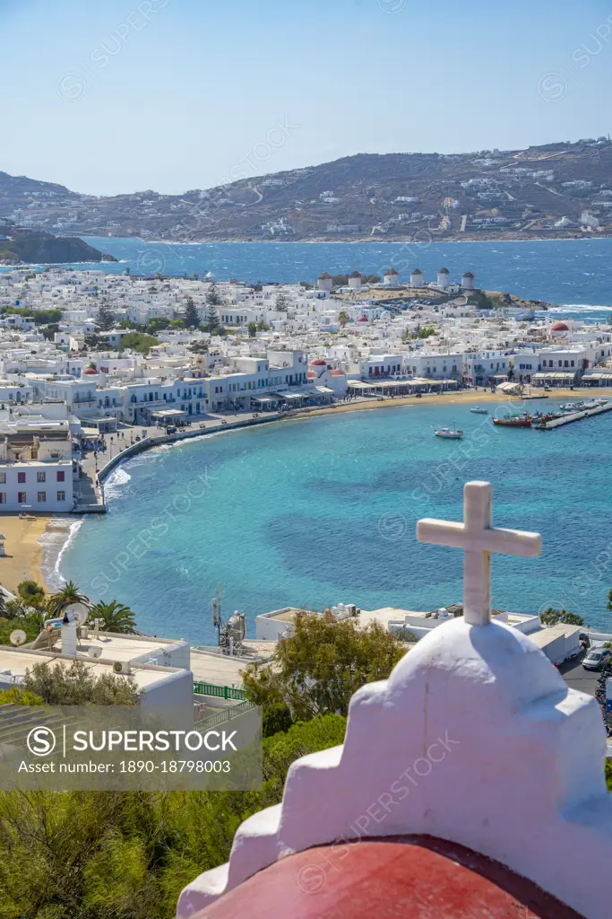 Elevated view of hilltop chapel, flour mills and town, Mykonos Town, Mykonos, Cyclades Islands, Greek Islands, Aegean Sea, Greece, Europe