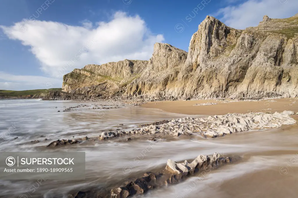 Dramatic cliffs and a deserted beach at the fabulous Mewslade Bay on the Gower Peninsula, Wales, United Kingdom, Europe