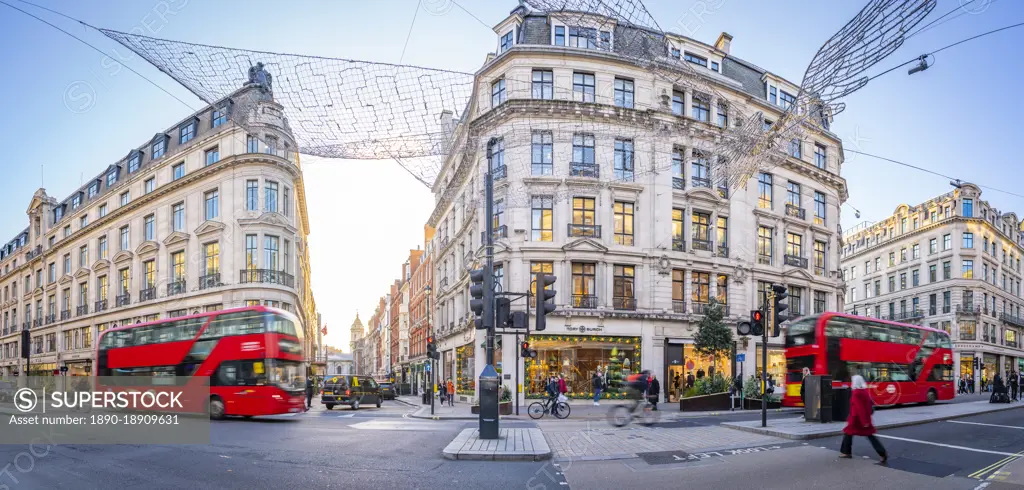 View of red buses on Regent Street at Christmas, London, England, United Kingdom, Europe