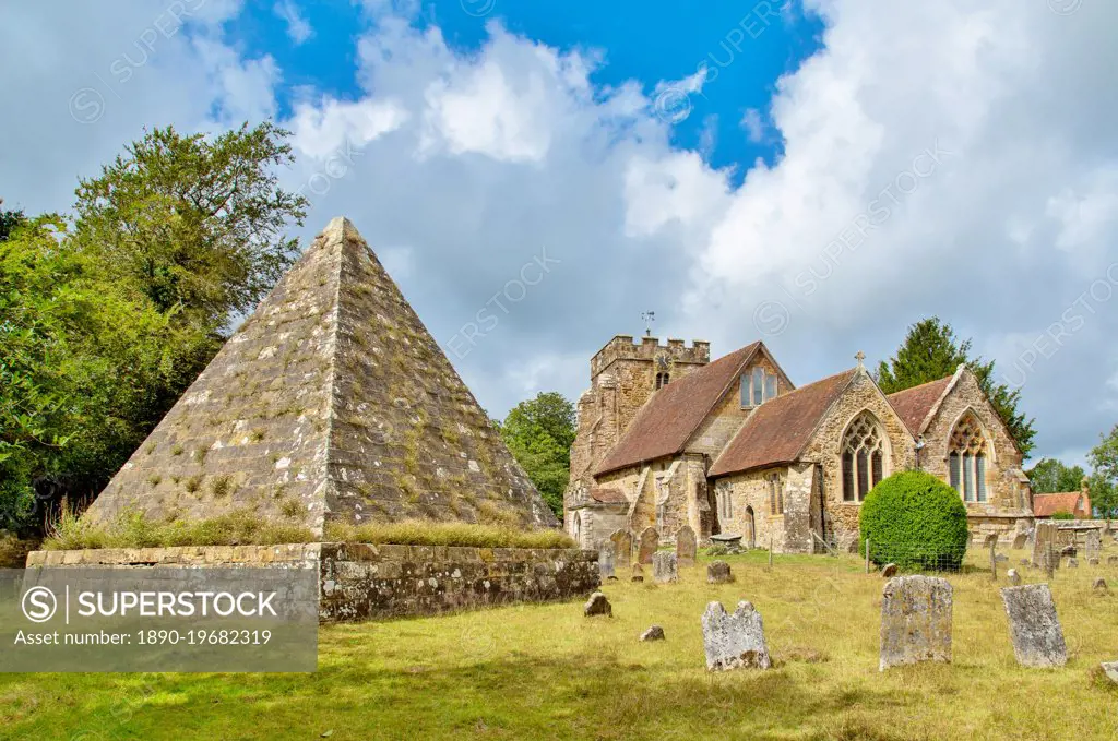 The 19th century pyramid under which the former local MP Mad Jack Fuller is buried in Brightling churchyard, East Sussex, England, United Kingdom, Europe