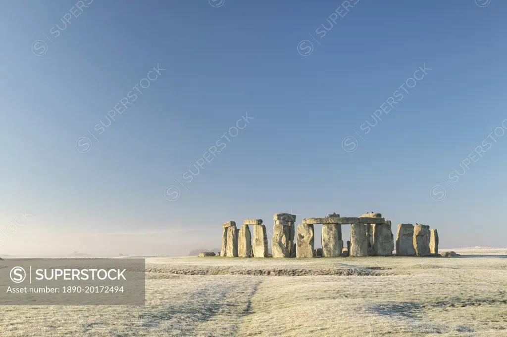 Stonehenge, UNESCO World Heritage Site, at dawn on a chilly frosty winter morning, Wiltshire, England, United Kingdom, Europe