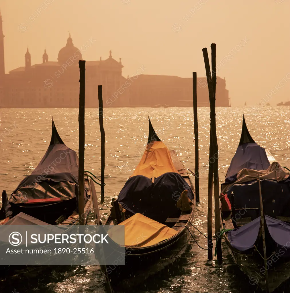 Gondolas on San Marco canal and church of San Giorgio Maggiore at sunset, Venice, Veneto, Italy, Europe