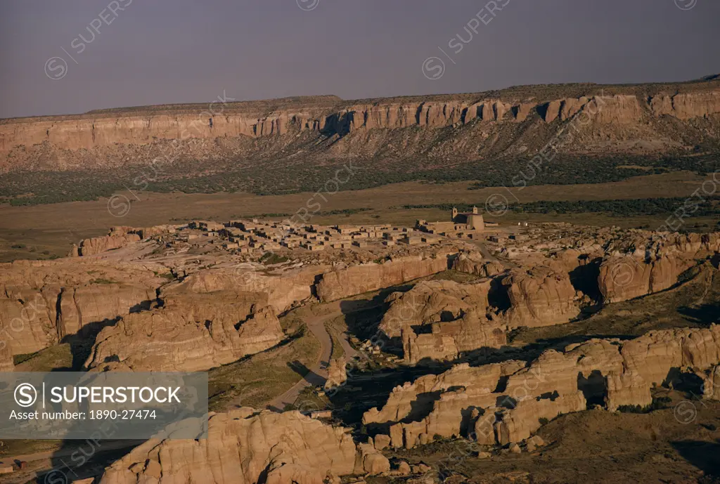 Aerial view over the village of Acoma Pueblo, in rocky landscape at dusk, New Mexico, United States of America, North America