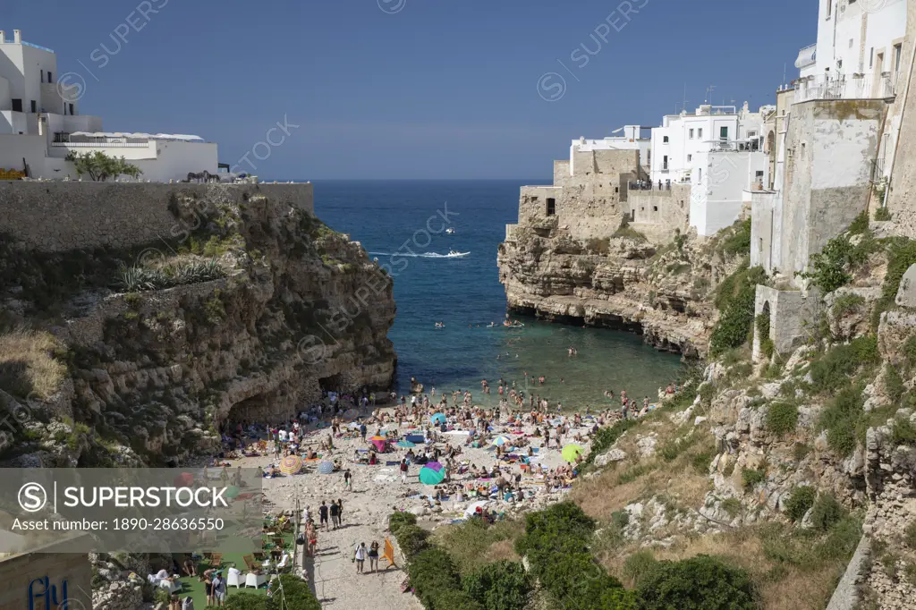 View of beach and old town on limestone cliffs seen from Ponte