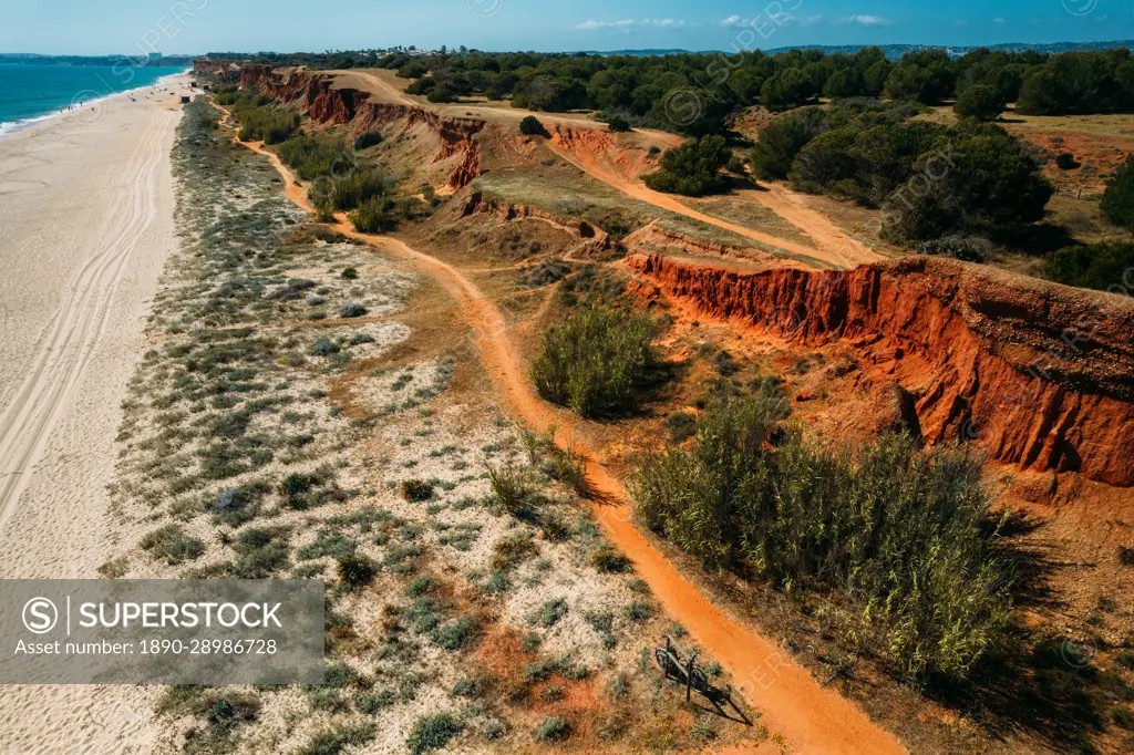 View of Praia da Falesia in Vilamoura, characterized by red cliffs, Algarve, Portugal, Europe