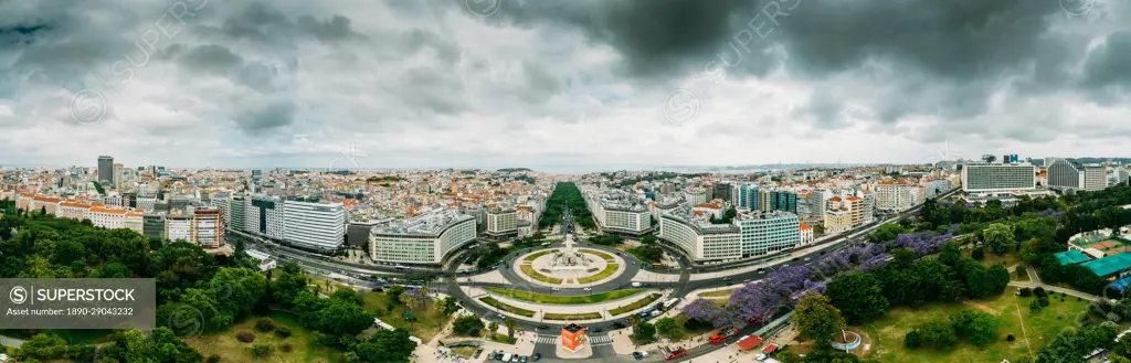 Aerial drone panoramic view of Parque Eduardo XII and Marques the Pombal looking south with Avenida da Liberdade in Lisbon, Portugal, Europe