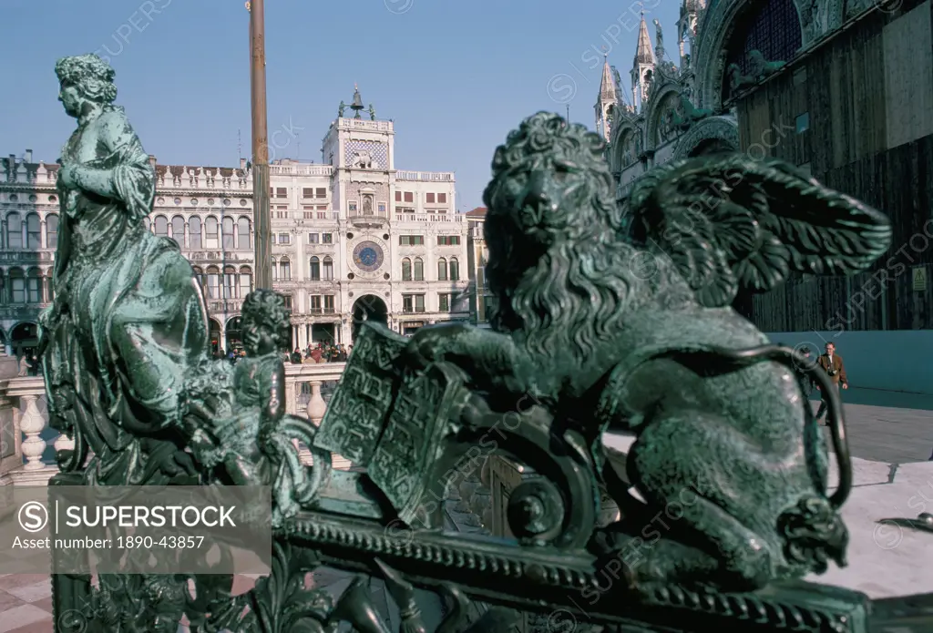 Winged lion and clock tower, St. Mark´s Square, Venice, UNESCO World Heritage Site, Veneto, Italy, Europe