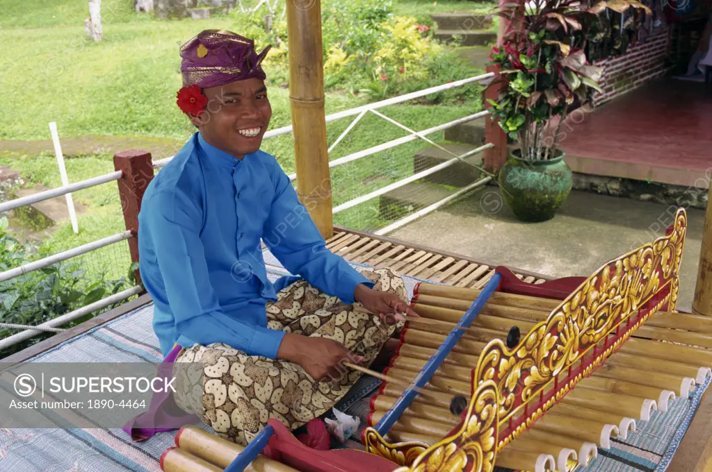 Portrait of a man playing the xylophone on Bali, Indonesia, Southeast Asia, Asia