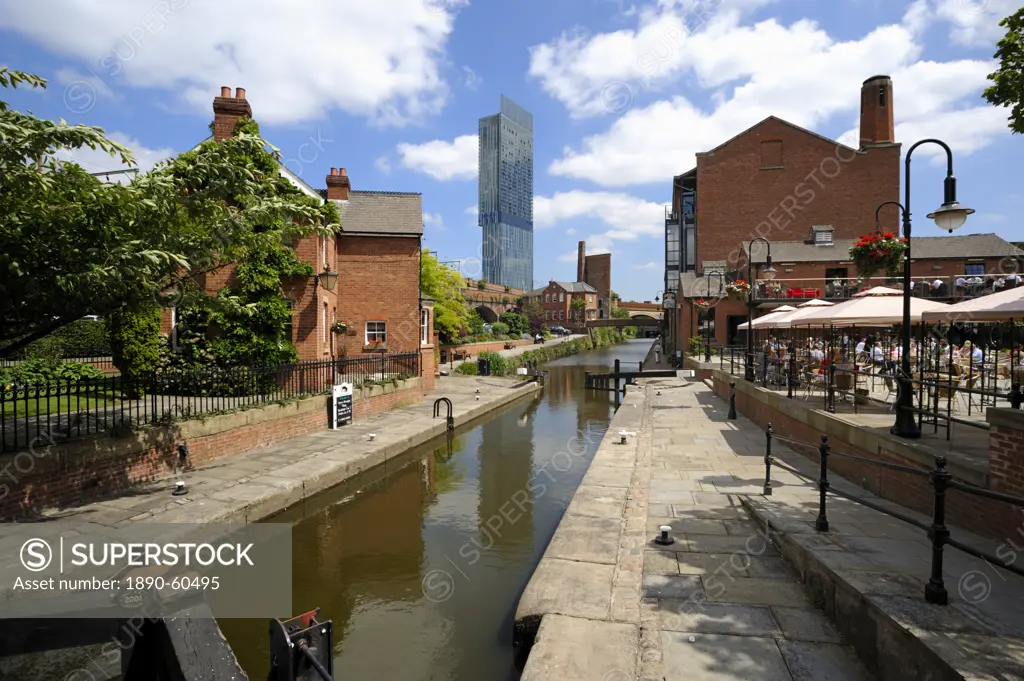 Canal and lock keepers cottage at Castlefield with the Beetham Tower in the background, Manchester, England, United Kingdom, Europe