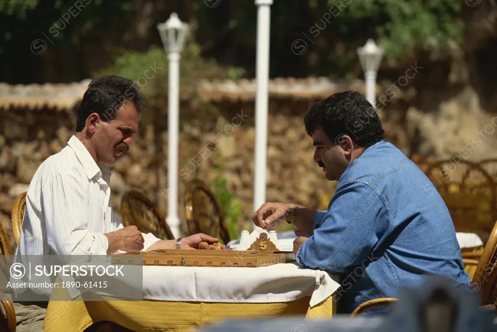 Men playing checkers in the Kaleici old town, Antalya, Anatolia, Turkey, Asia Minor, Eurasia