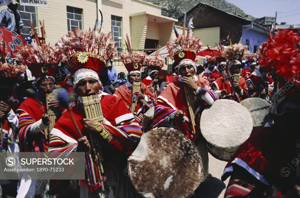 Musicians in bright costumes, Puno, Peru, South America