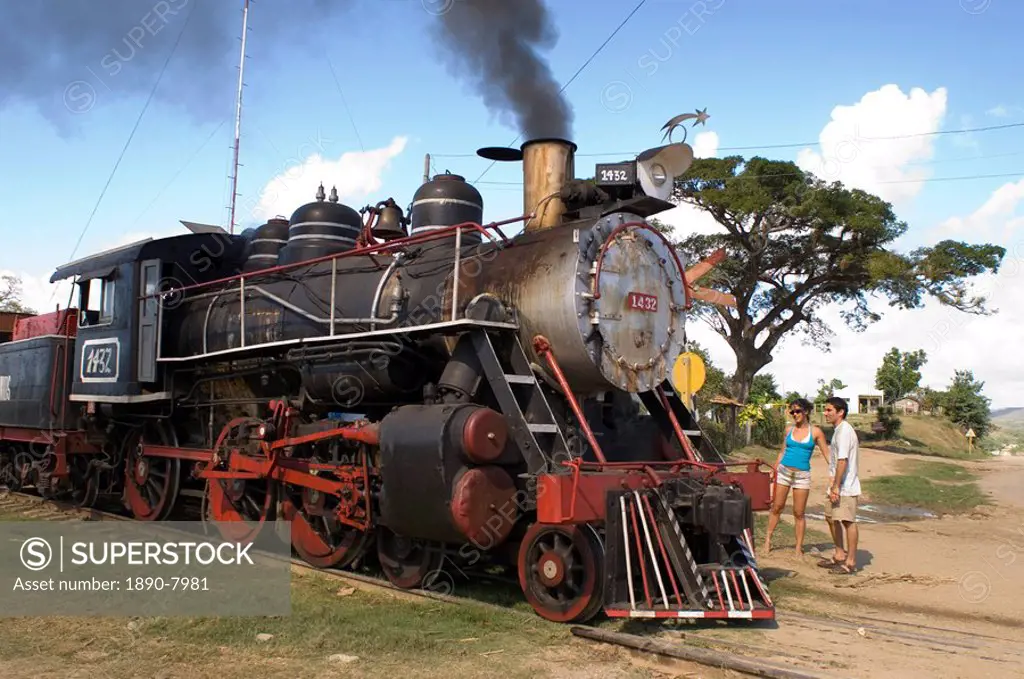 A steam train on the railway originally built to transport the sugar cane crop, in the Valle de los Ingenios, central Cuba, West Indies, Central Ameri...