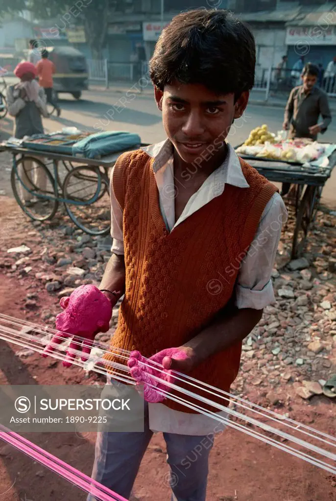 Kite string production, string is coated in ground glass for fighting kite  festival in January, Ahmedabad, Gujarat state, India, Asia - SuperStock