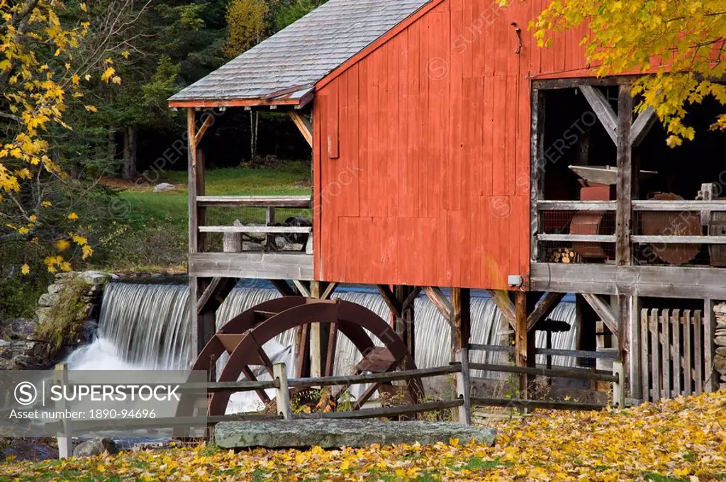 Autumn foliage around the old mill and waterfall in Weston, Vermont, New England, United States of America, North America