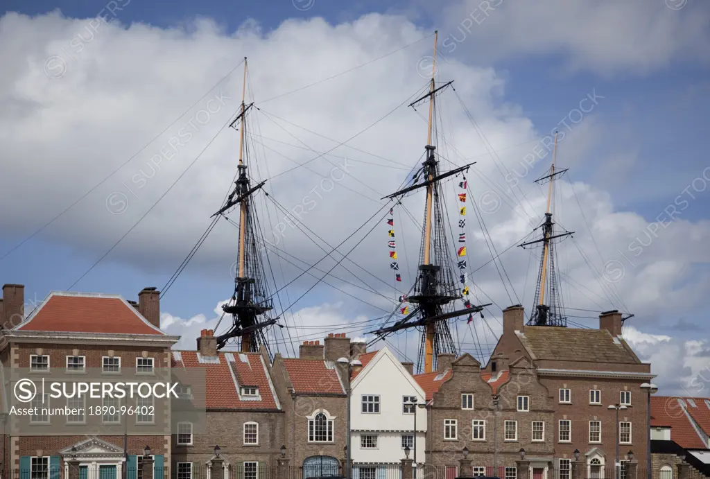 Masts and rigging of HMS Trincomalee, British Frigate of 1817, seen above old buildings at Hartlepool´s Maritime Experience, Hartlepool, Cleveland, En...