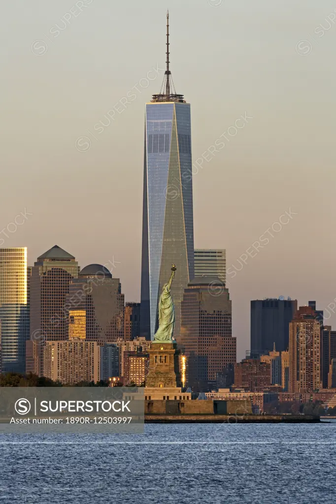 Statue of Liberty, One World Trade Center and Downtown Manhattan across the Hudson River, New York, United States of America, North America